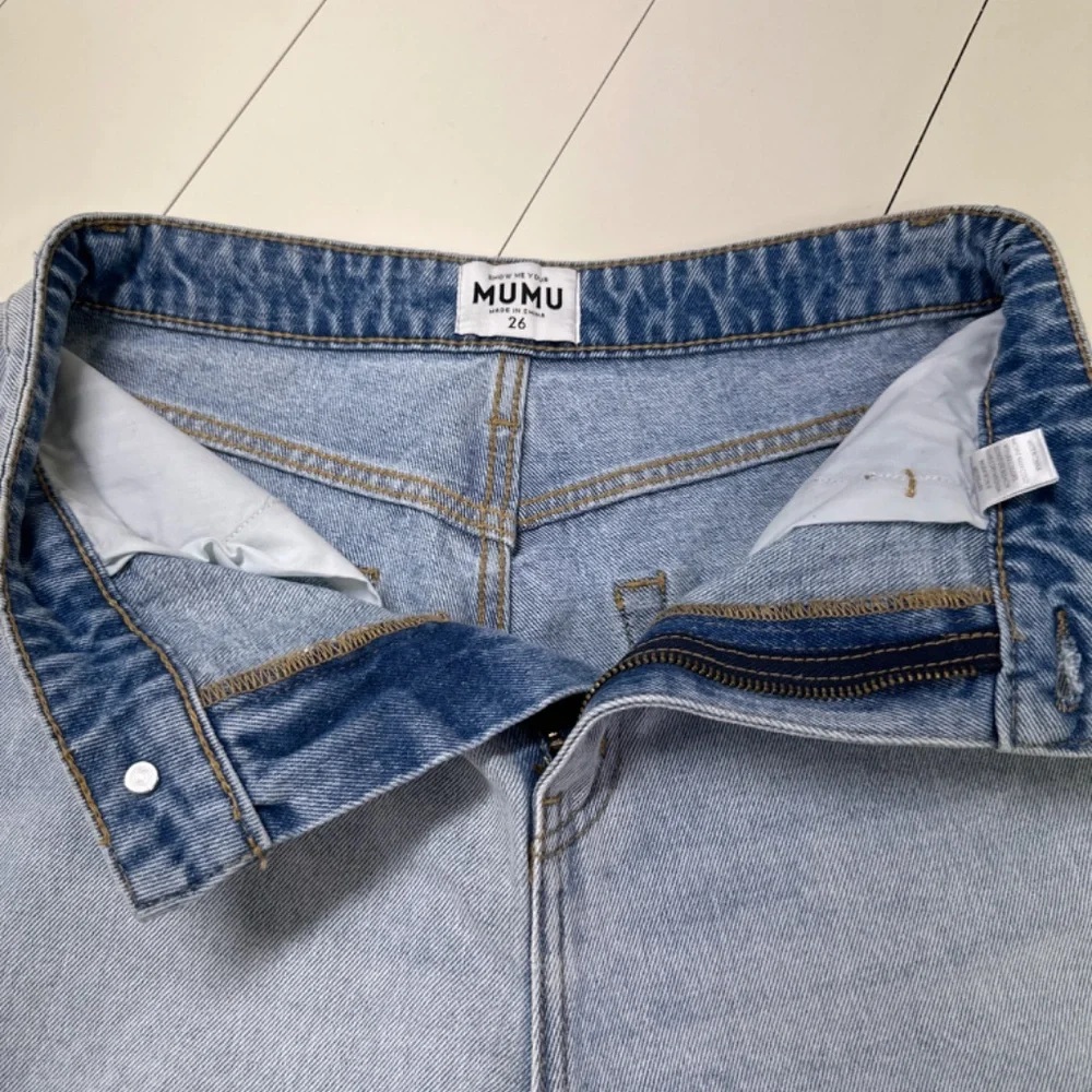 Long Denim distressed Denim shorts